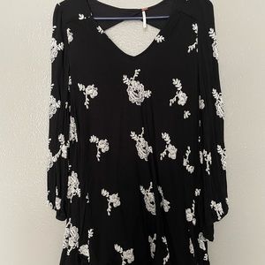 Free People black babydoll dress with white embroidered flowers